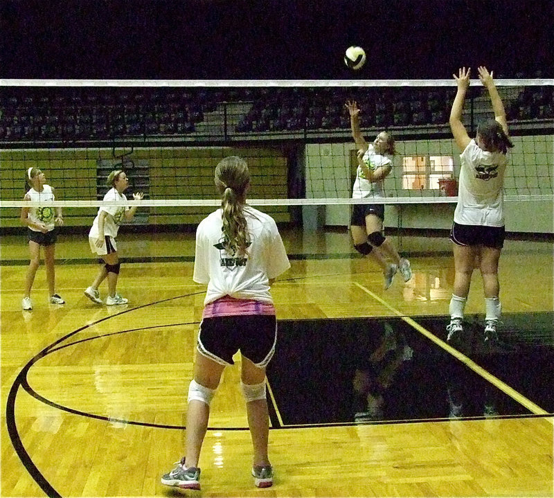 Image: Defenders, Brooke DeBorde and Reagan Adams, are ready to react to a return from Jaclynn Lewis.