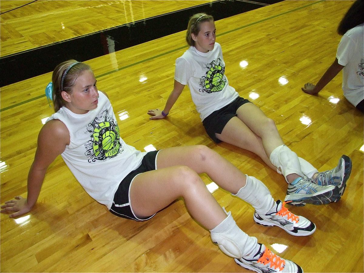 Image: Madison Washington and Kelsey Nelson relax during the awards ceremony.