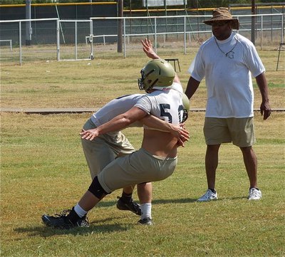 Image: Brandon Souder and Ethan Saxon(50) are a bit rambunctious without pads on.