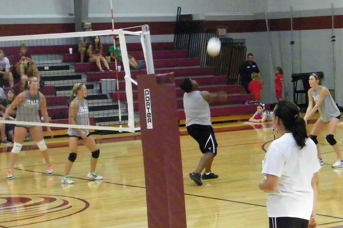 Image: Senior, Jimesha Reed volleys the ball up for a save.