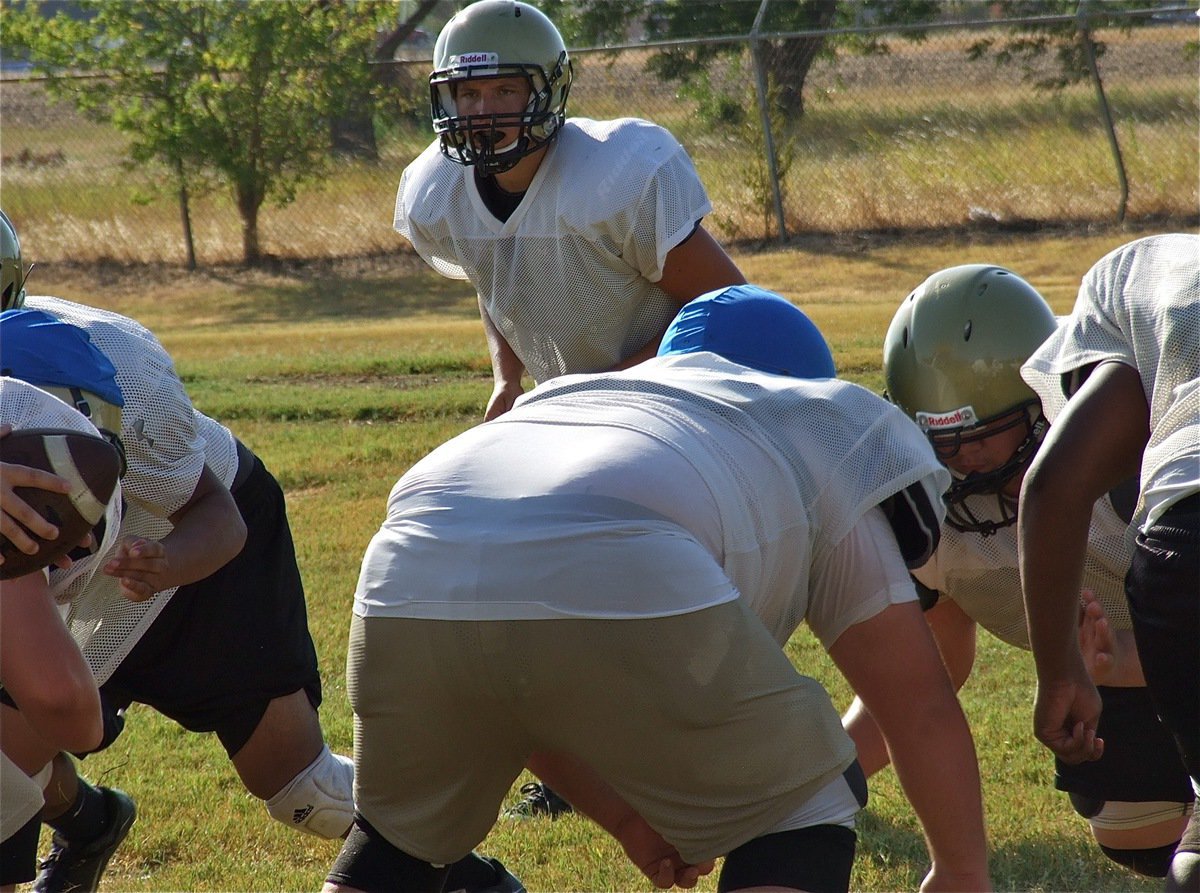 Image: Kyle Jackson glares across the line and into the backfield.