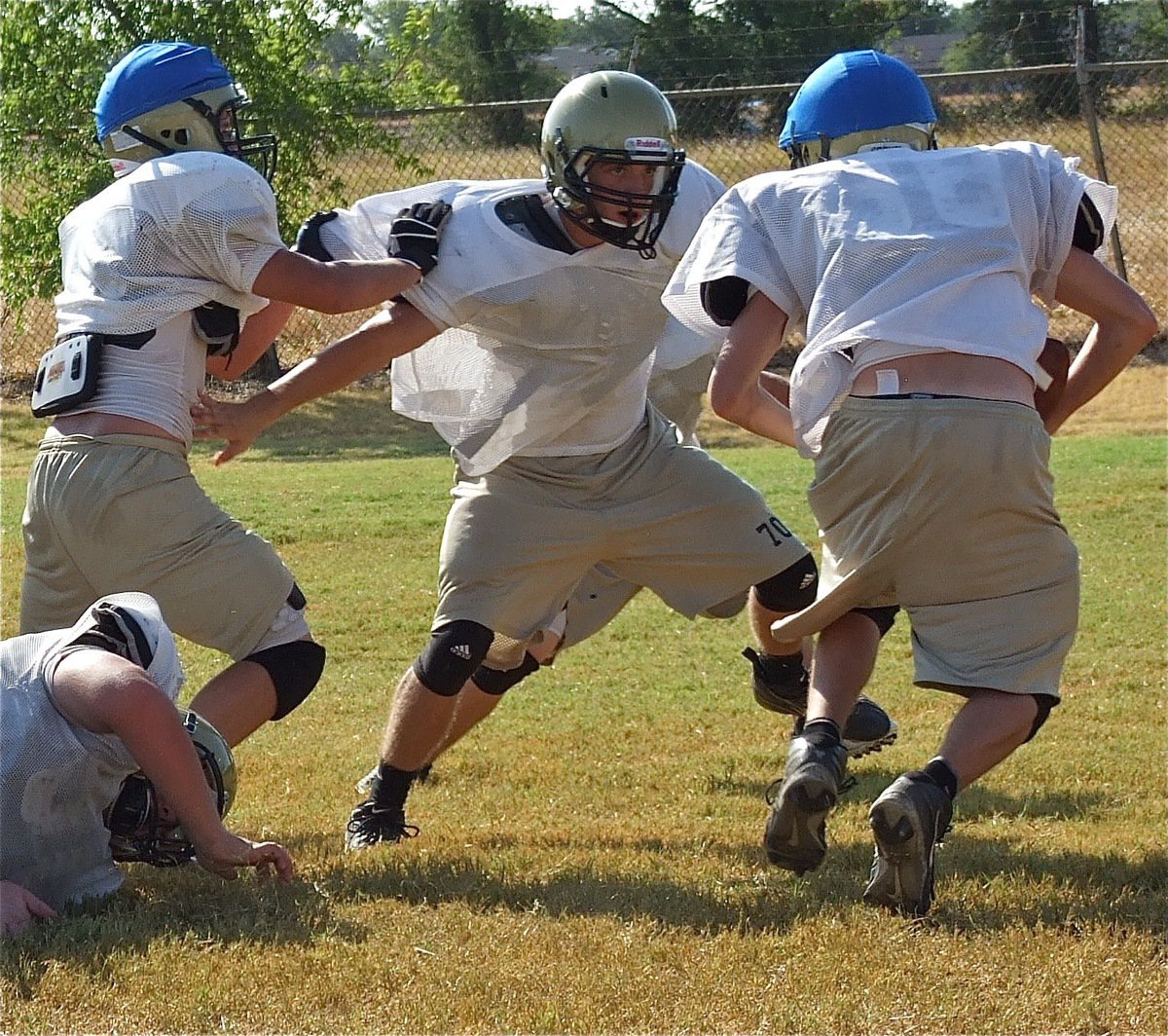 Image: Brandon Souder keeps his outside arm free and attaches to the ball carrier.