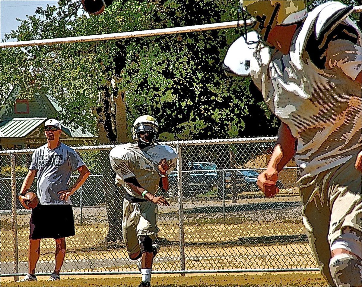 Image: Eric Carson leads his receiver with a perfect pass.