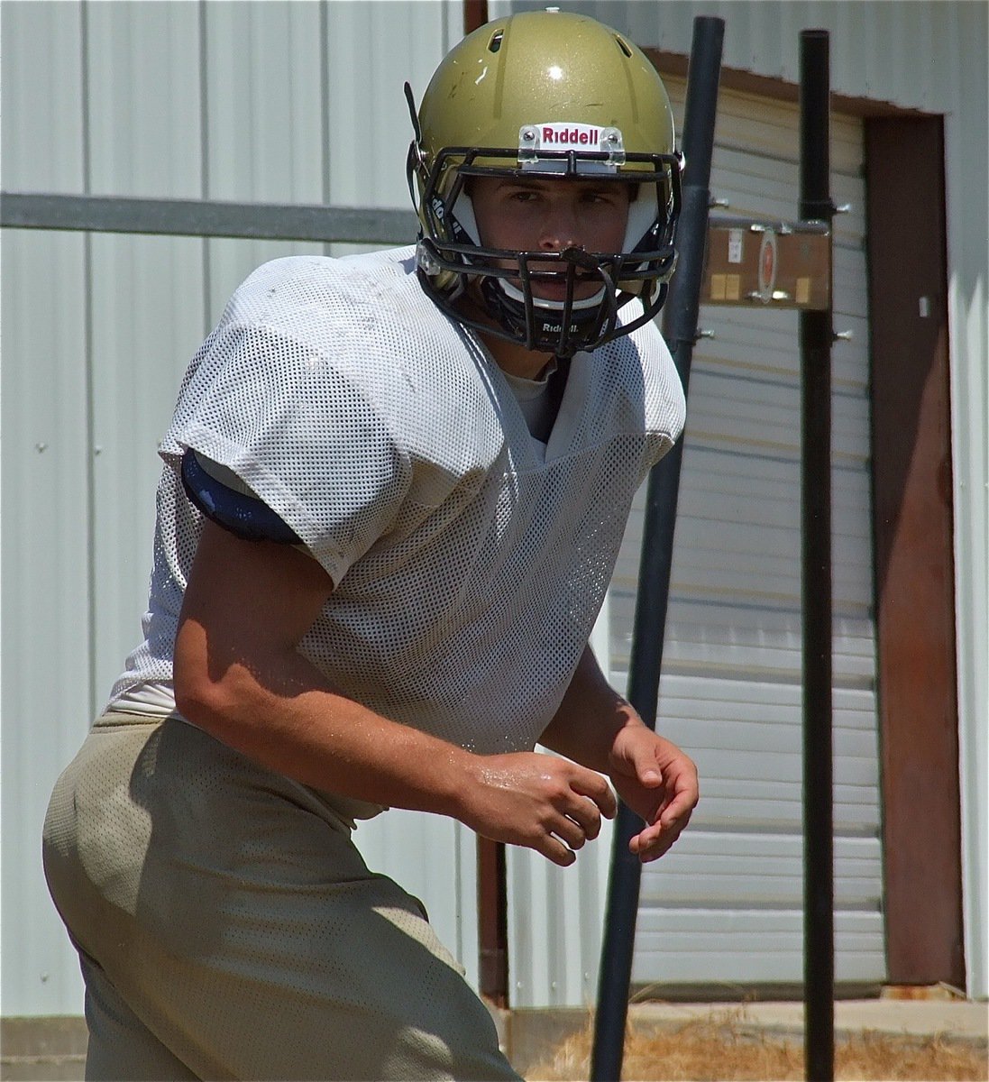 Image: Ethan Saxon prepares to run a pass route.