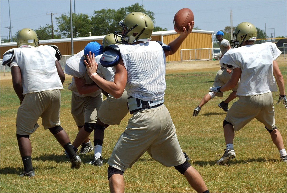 Image: Jase Holden enjoys a comfortable throwing pocket behind, Adrian Reed, Larry Mayberry, Jr. and Chase Hamilton.