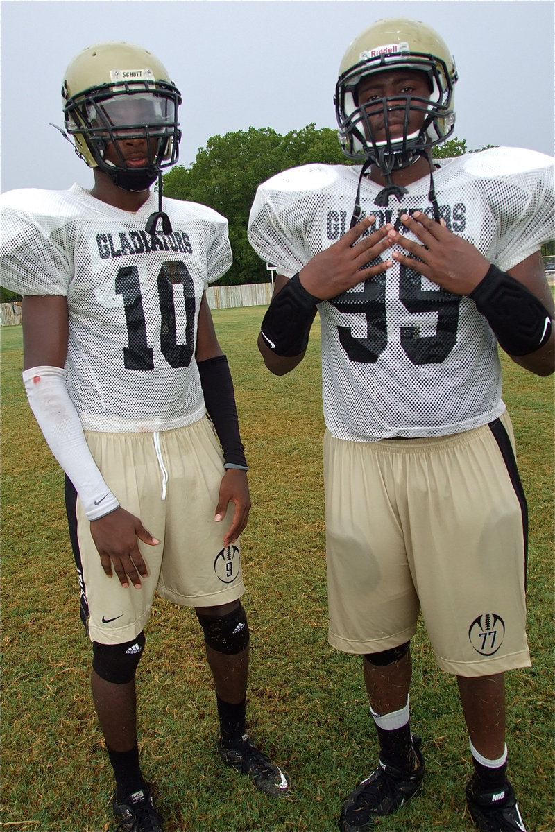 Image: Devonta Simmons and Larry Mayberry, Jr. stand proud during he scrimmage against Valley Mills. Do they make tall angle lenses?