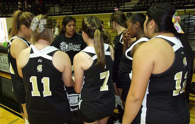 Image: Lady Gladiators’ JV head coach Tina Richards talks with her team before their game against the Kerens JV squad.