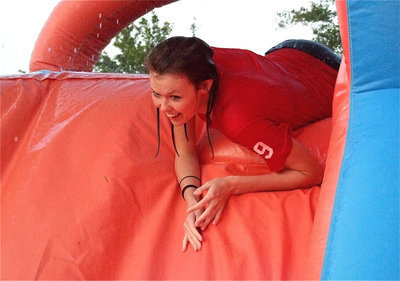 Image: Kaitlyn Rossa makes it to the top of the slide.