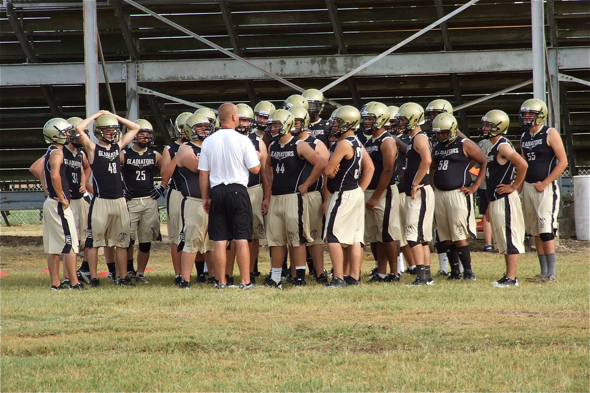 Image: Defensive coach, Jeff Richters, gets the newly outfitted Gladiators prepped for their practice sets.