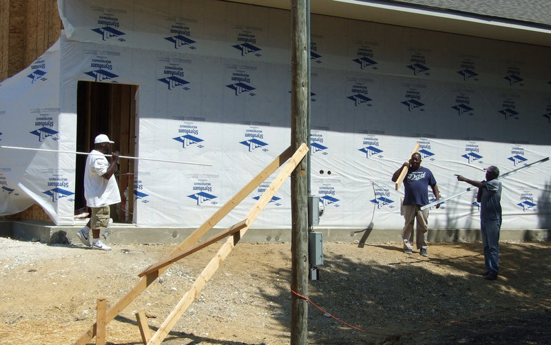 Image: Church members of Mt. Gilead help with some of the labor.