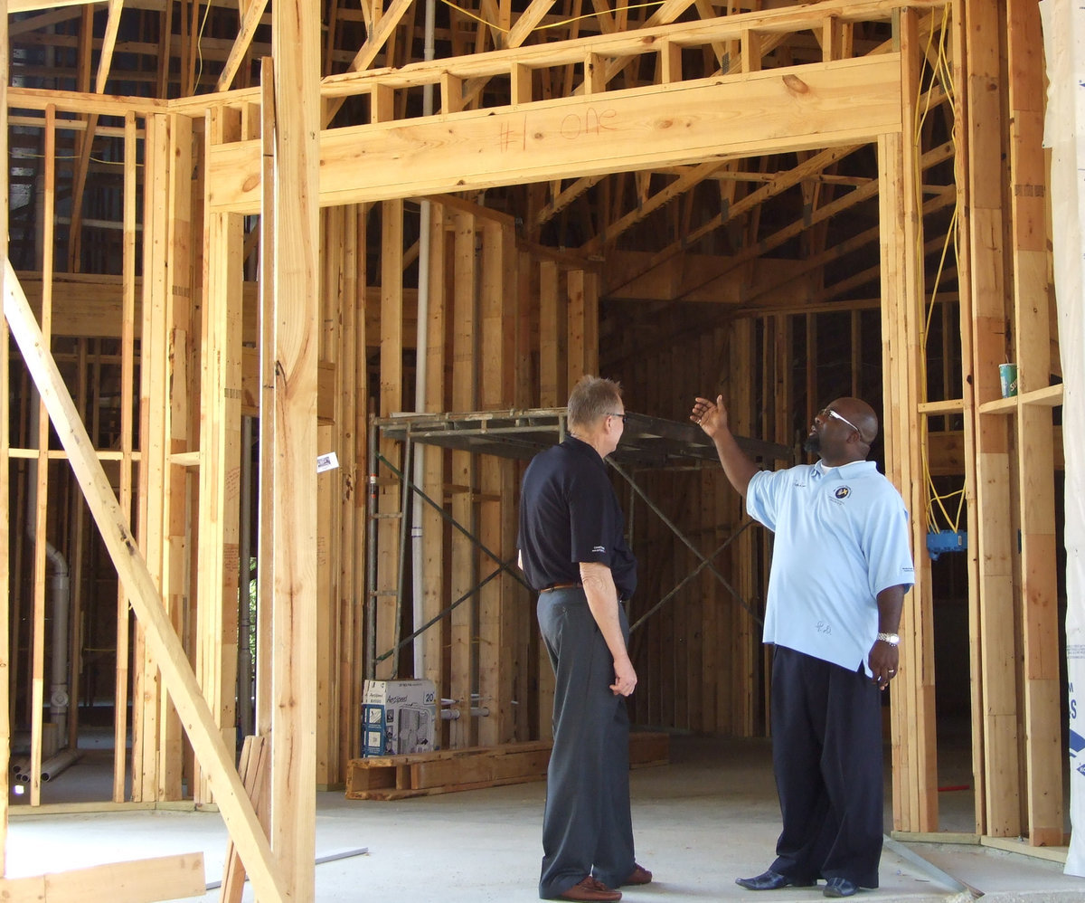 Image: Pastor Dixon shows off the foyer area, which will be decorated beautifully for the King of Kings.