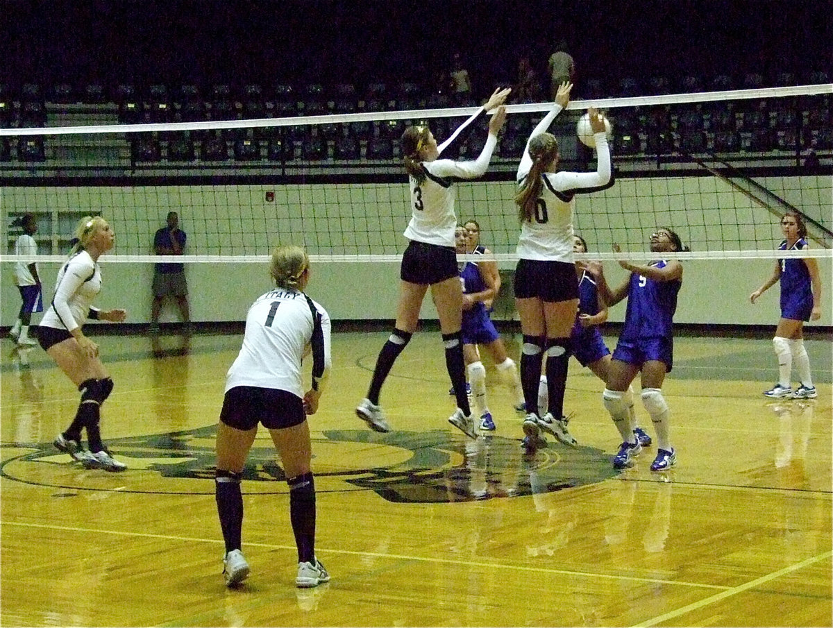 Image: Kaitlyn Rossa(3) and Madison Washington(10) go for the block.