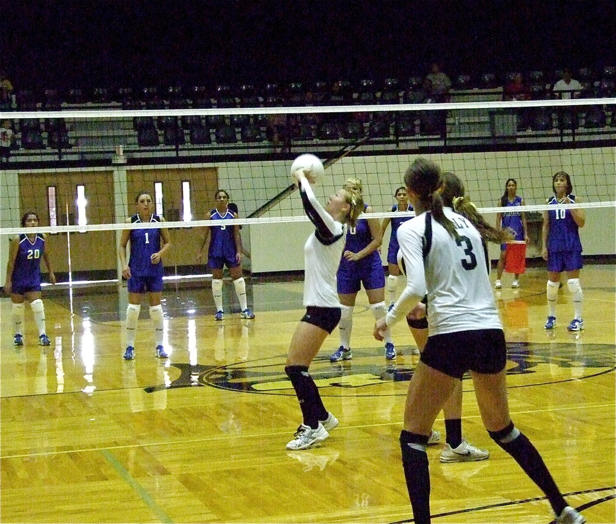 Image: Bailey Eubank sets the ball for her teammates.