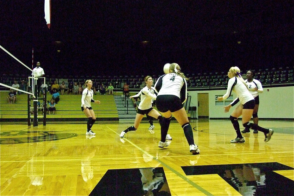 Image: Bailey Eubank(1), Kaitlyn Rossa(3), Jaclynn Lewis(4), Megan Richards(7) and Jimesha Reed(12) converge on the ball.