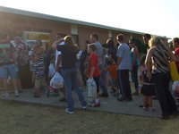 Image: Long line of excited students and parents ready to me the teachers at Stafford Elementary.