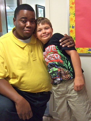Image: Principal Jason Miller with third grader Will Brooks.