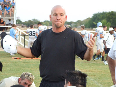 Image: Coach Jeff Richters addresses the varsity at half time.