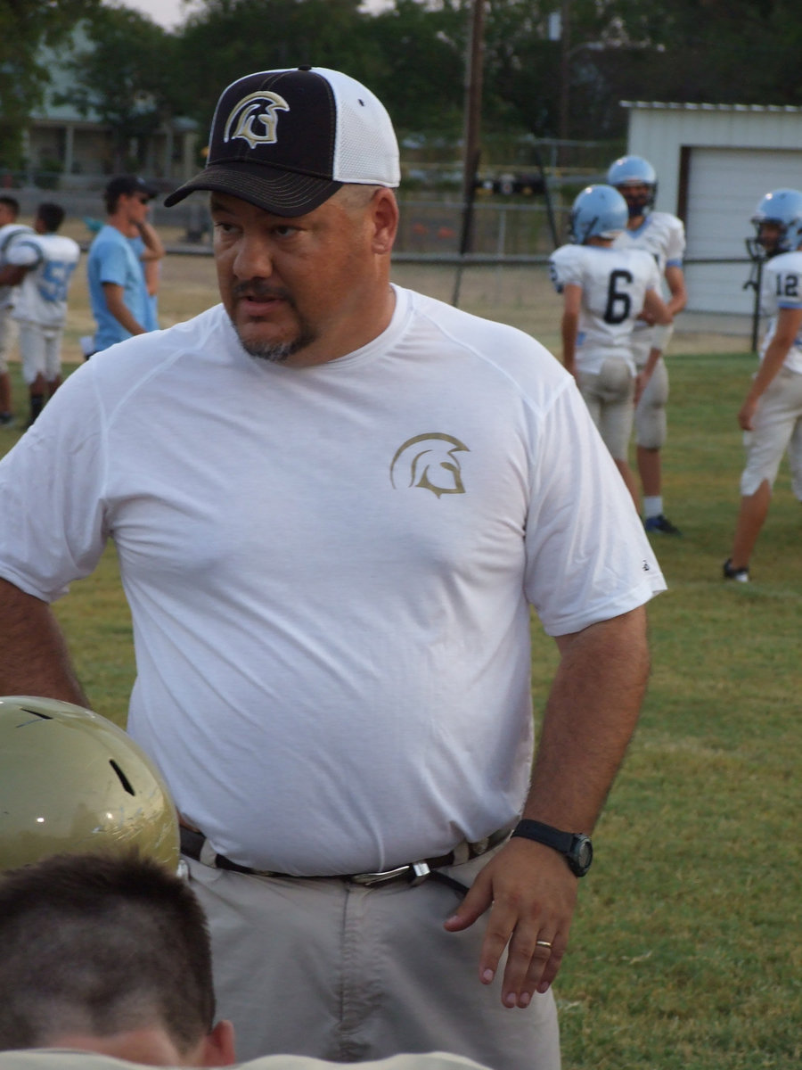 Image: Head coach Craig Bales lets the players know how well they were performing.