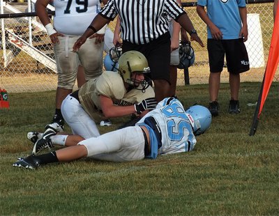 Image: Shad Newman covers a Cougar receiver along the Waco Reicher sideline.