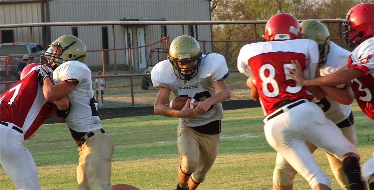 Image: Shad Newman(25) and Zain Byers(50) pave the way for Justin Wood(48).