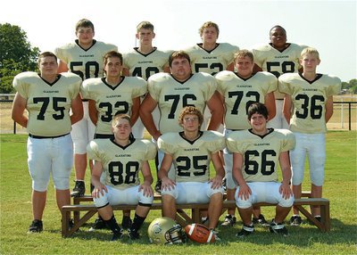Image: Known as the ‘Dirty Dozen,’ the 2011 Italy JV Gladiators are: (Front row) John Escamilla(88), Shad Newman(25) and Kyle Fortenberry(66). (Middle row) Kelton Bales(75), Cody Medrano(32), Hank Seabolt(76), Colin Newman(72) and Cody Boyd(36). (Back row) Zain Byers(50), Justin Wood(48), Bailey Walton(52) and Darol Mayberry(58).