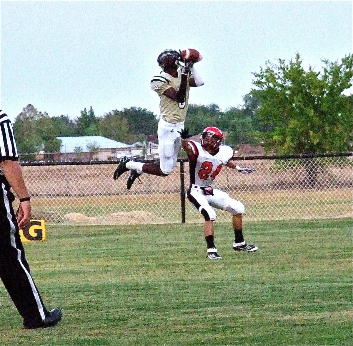 Image: Italy’s 6’,5" Devonta Simmons(9) just misses a touchdown catch in the first quarter with Maypearl’s Tristan Spradling(24) covering. Spradling’s father was a Gladiator in the late 80s.