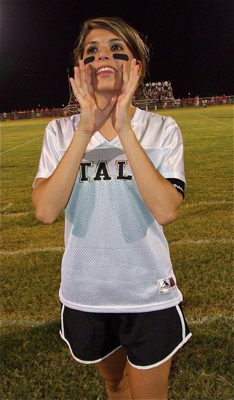 Image: Italy High School cheerleader Beverly Barnhart shouts a cheer for all to hear.