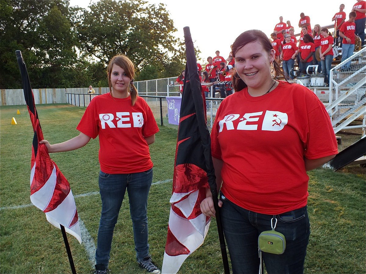 Image: Katelynn Smith and Meagan Buchanan are representing the Italy Gladiator Regiment Band’s flag corp.