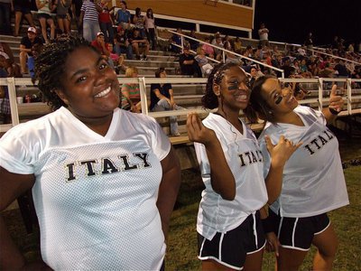 Image: Italy High School mascot Sa’Kendra Norwood and cheerleaders Kendra Copeland and Destani Anderson show out on the sideline.