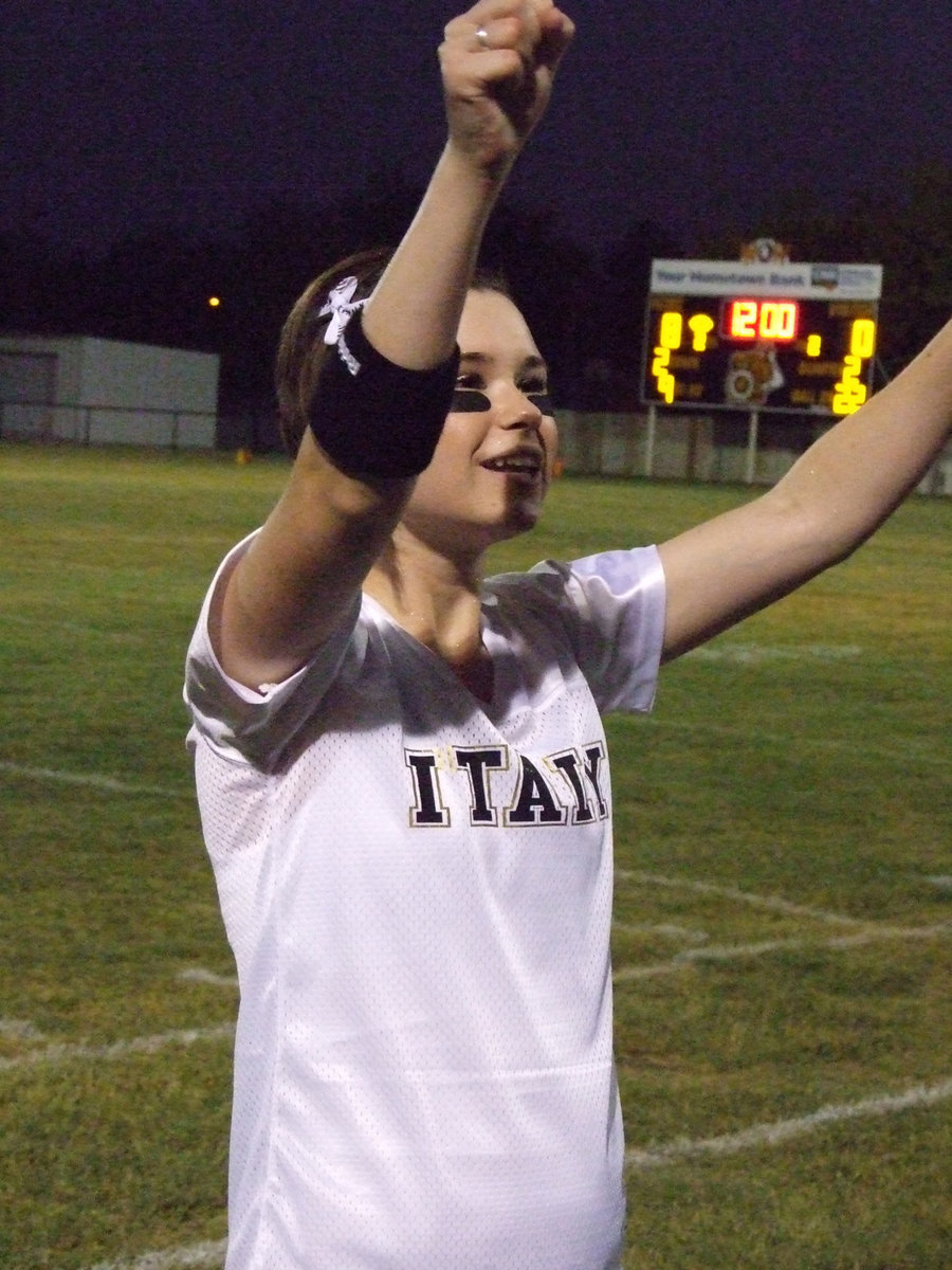 Image: Meagan Hooker gets the crowd ready to cheer the third quarter.