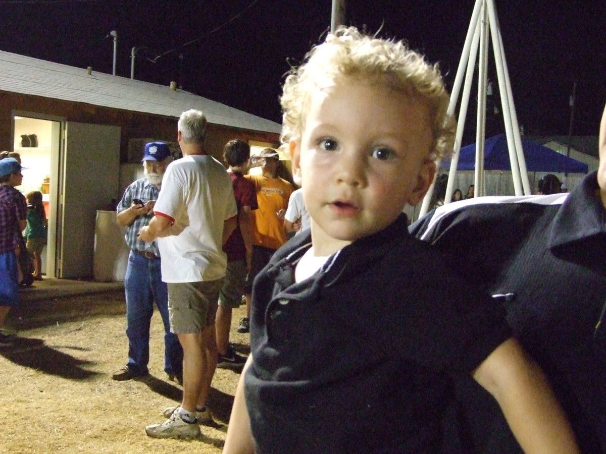 Image: Christian Gray, Pastor Todd’s son, is excited to be at the game. Christian commented after Italy’s big win over Maypearl by saying, “Ball.”