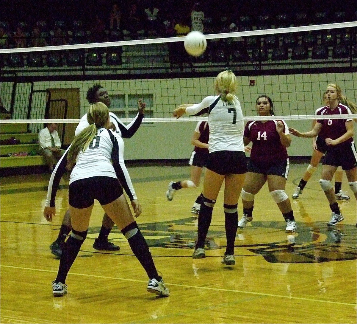 Image: Megan Richards(7) bump passes for Jimesha Reed(12) with Madison Washington(10) backing them up against Mildred.