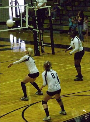 Image: Megan Richards(7) uses the bump pass to help set up her teammates.