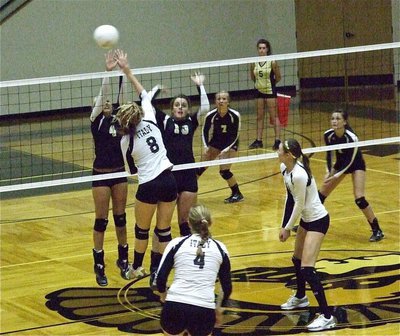 Image: Bailey Bumpus(8) goes for the kill shot.