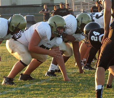 Image: Italy JV offensive linemen, Kyle Fortenberry, Kelton Bales and Darol Mayberry get set to block. 