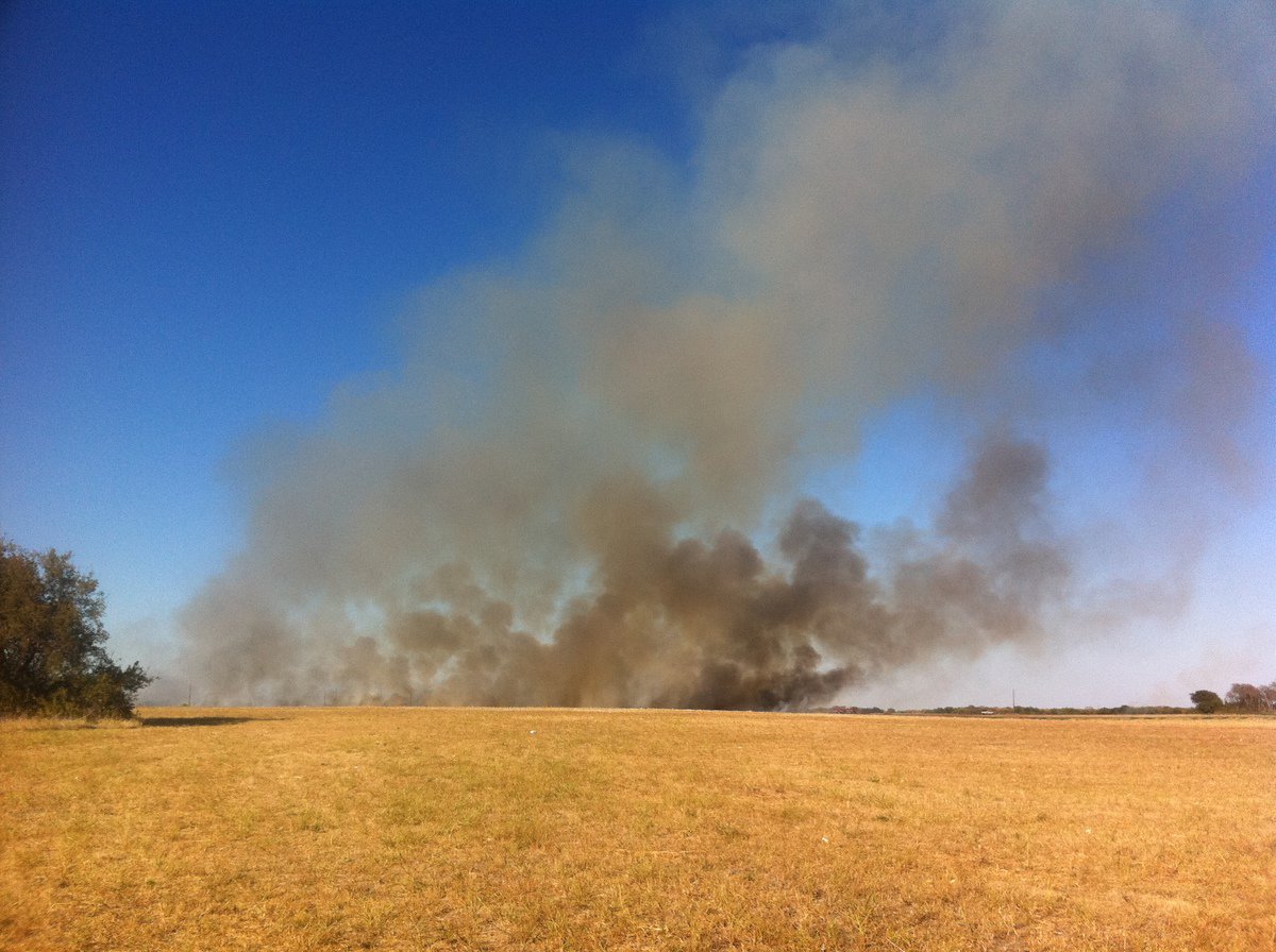 Image: Grass fire flares up just outside Italy late Friday evening.