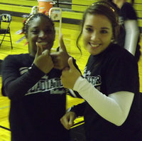Image: Jameka Copeland and Alyssa Richards are warmed up and ready for the game against the Malakoff Lady Tigers.