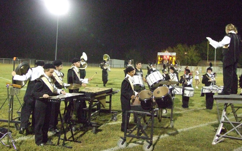 Image: The IHS Regiment Band is ready for halftime under the leadership of Drenda Burke.