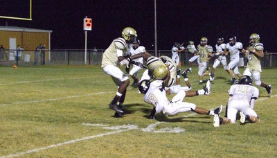 Image: Ryheem Walker(10) runs for a first down in overtime for Italy.