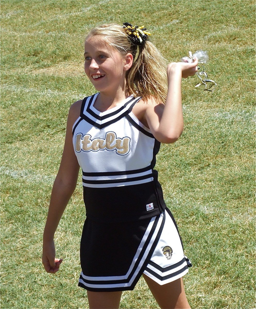 Image: IYAA A-Team Cheerleader Hannah Haight tosses a gift bag into the stands.