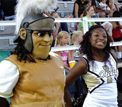 Image: Gladiator mascot Sa’Kendra Norwood and IHS cheerleader Jameka Copeland smile for the camera.