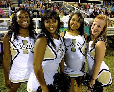 Image: IHS cheerleaders Jameka Copeland, Ashley Harper, Destani Anderson and Felicia Little are all smiles on the sideline.