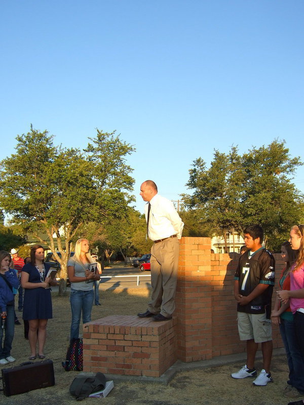 Image: Principal Lee Joffre speaks to the students about unity.