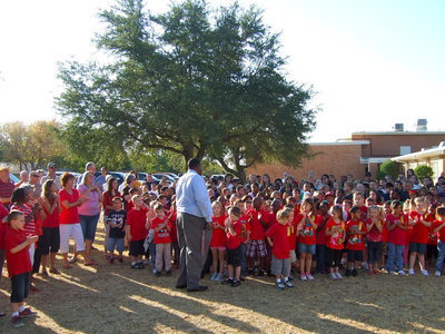 Image: Principal Jason Miller (Stafford Elementary) telling the students about the tragedy of September 11th.