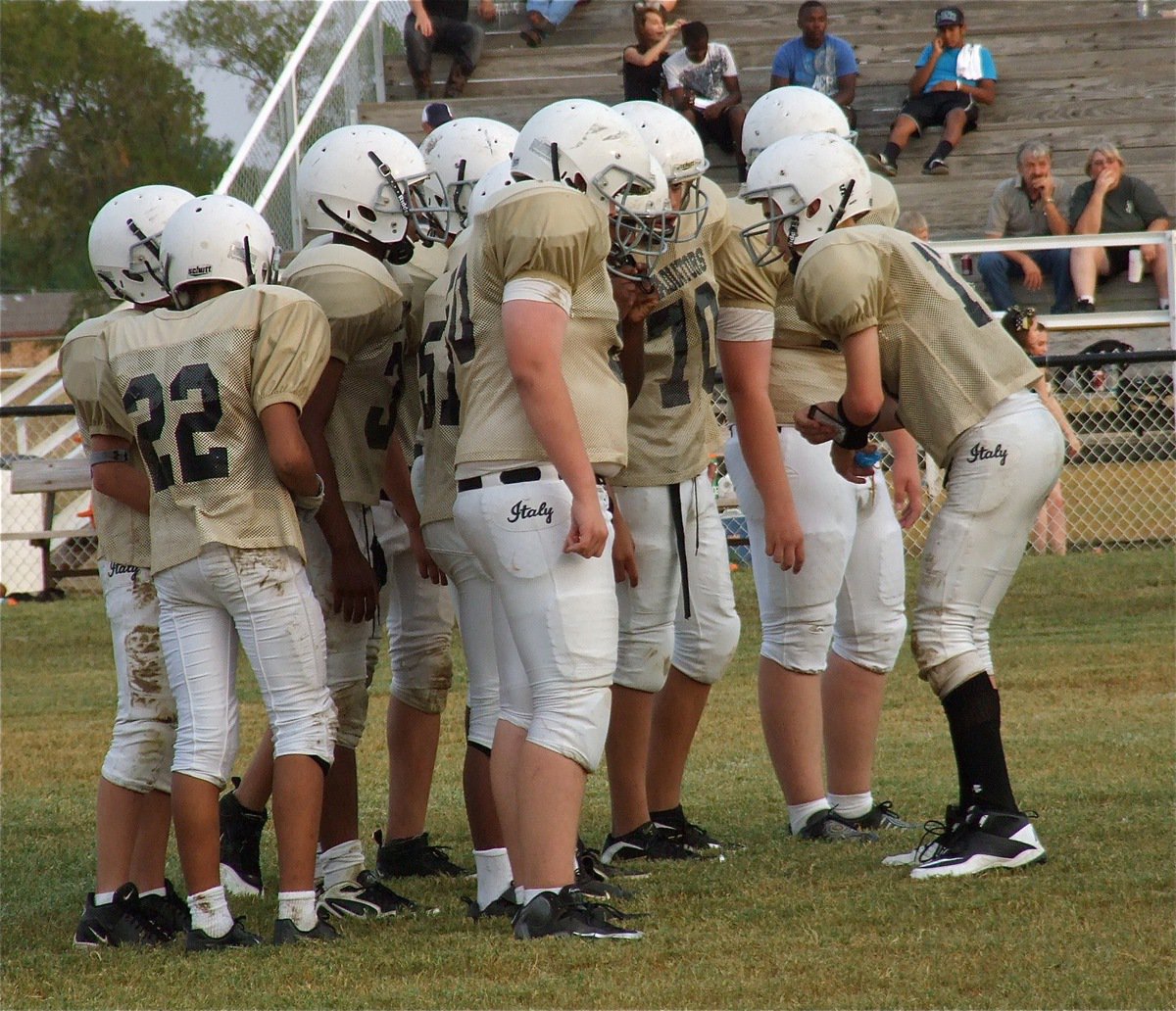 Image: All eyes and ears are on Ryan Connor(17) as he calls an offensive play during a critical part of the game.