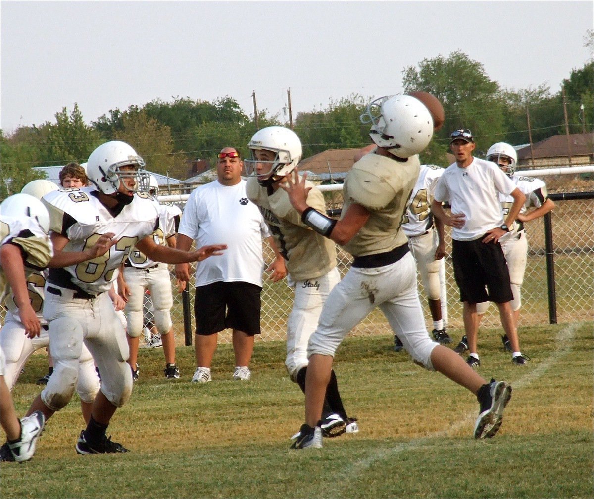 Image: Shatrickery, Joseph Celis(6) fakes the run and pulls up to pass.