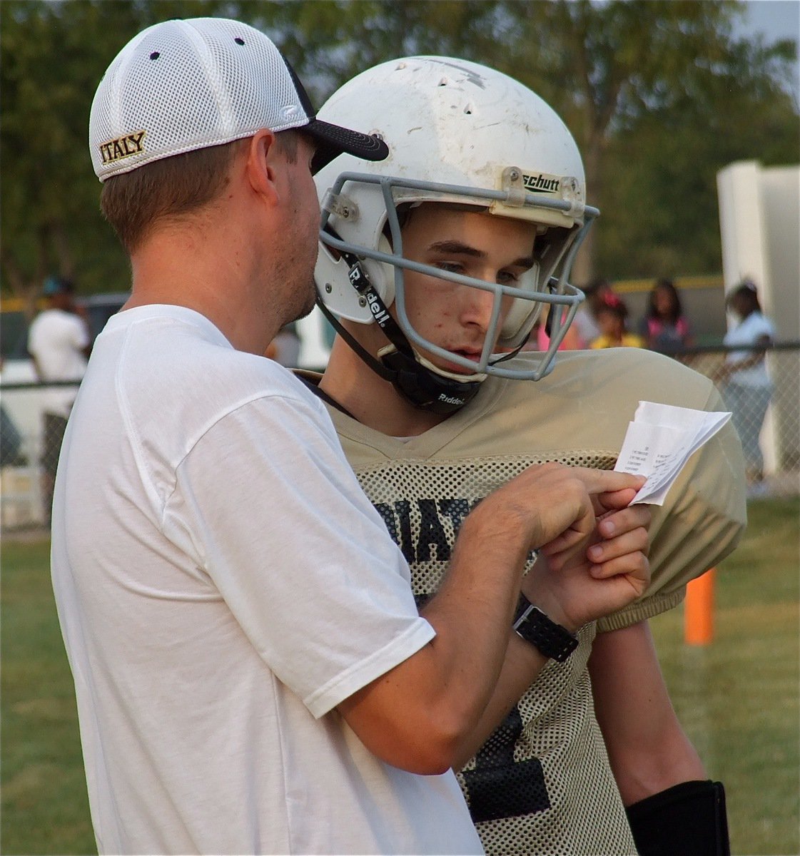 Image: Coach Callahan shows quarterback Ryan Connor the special secret formation.