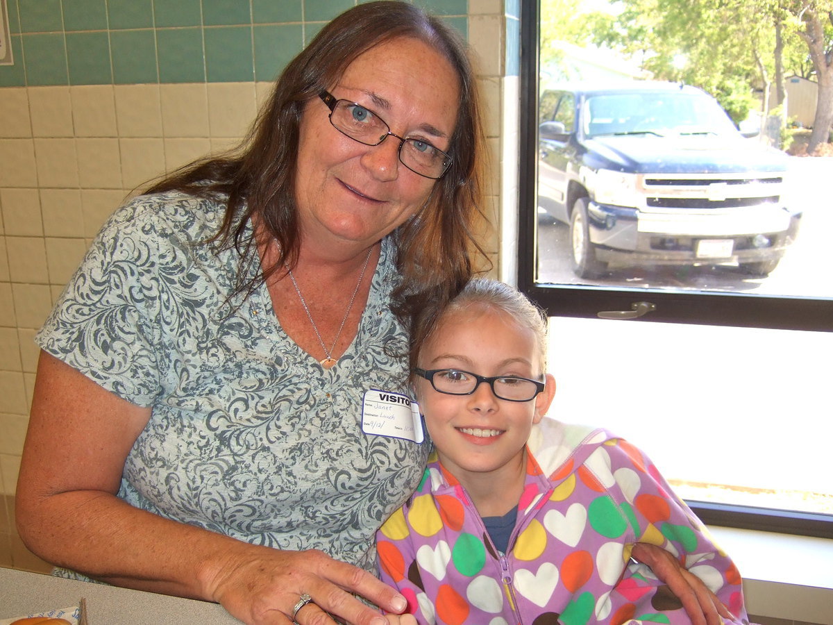 Image: Janet Evans and her granddaughter Madelyn Chambers.