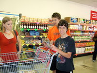 Image: Jennifer Witeley (Avalon ISD CBI Teacher) helping her students shop.