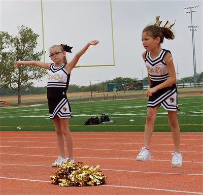 Image: Maddie and Emma get their cheer on.